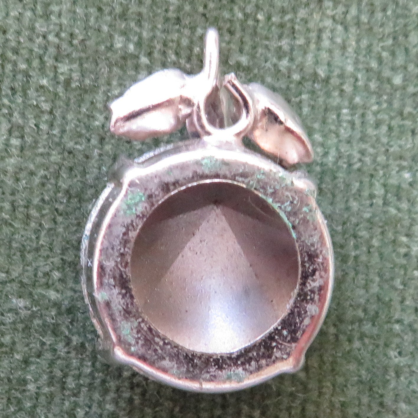 White Metal Pendant With An Aqua Simulated Stone