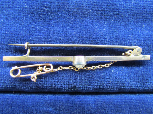 9ct Gold Bar Brooch With A Bezel Set Brilliant Cut White Sapphire