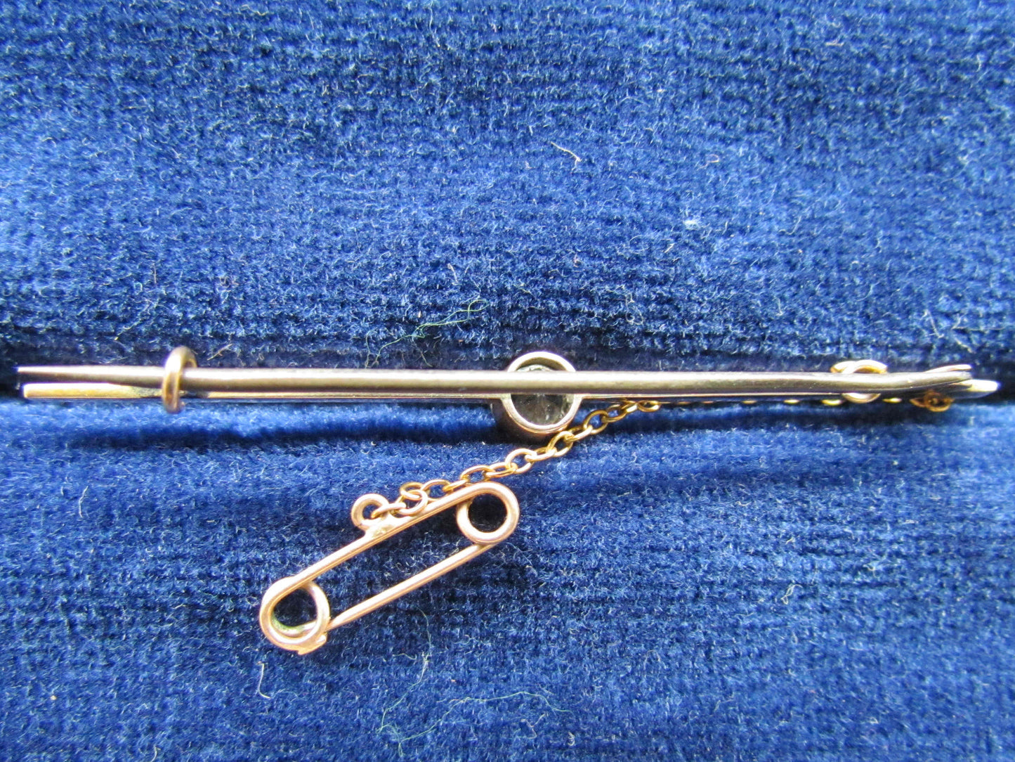 9ct Gold Bar Brooch With A Bezel Set Brilliant Cut White Sapphire