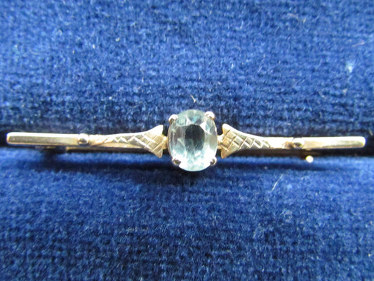 Unmarked Gold Bar Brooch With A Claw Set Paste Stone