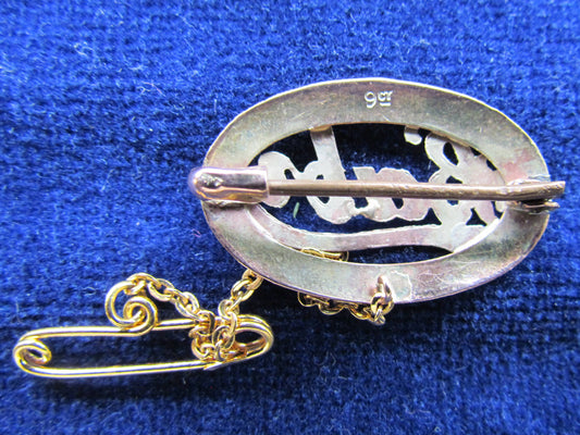 9ct Gold Baby Brooch Pierced In An Oval With Safety Chain