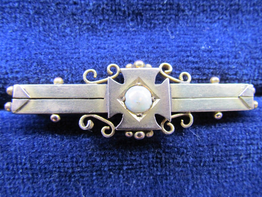 9ct Gold Bar Brooch Set With A Milk / White Opal In A Maltese Cross