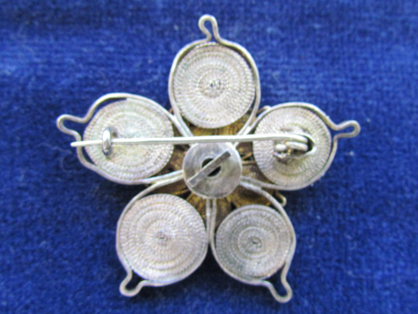 Silver And Gilt Wire Brooch In An Asymmetrical Flower Form
