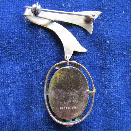 9ct Gilt Lined Cameo Pendant Suspended From A Chased Ribbon Brooch