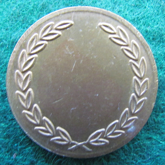 Token Blank Depicting A Wreath On The Face Side