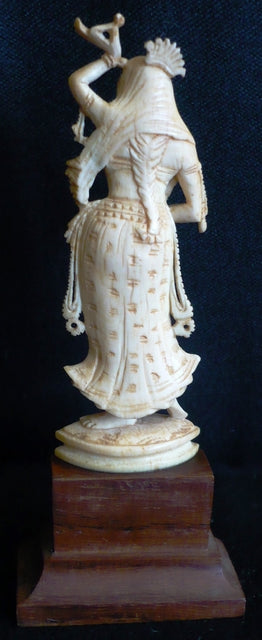 Ivory figure of a Dietie India late 19th century mounted on a rosewood base