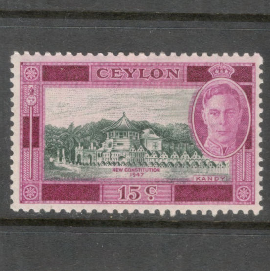Ceylon 1947 15 Cent Violet Red / Blackish Green King George VI Local Motives Stamp - Perfin: 11.0x11.75