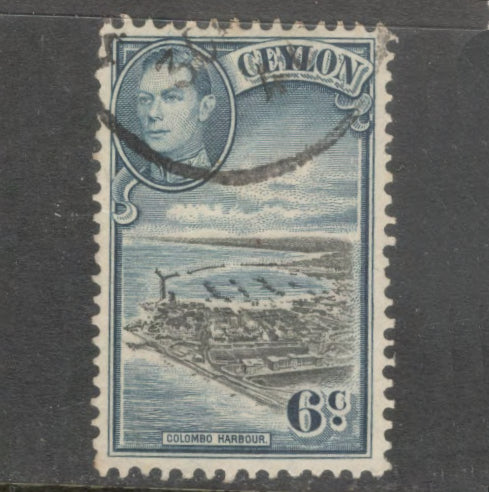 Ceylon 1938 - 1949 6 Cent Blue / Black King George VI Local Motives Stamp - Perfin: 11.0x11.5