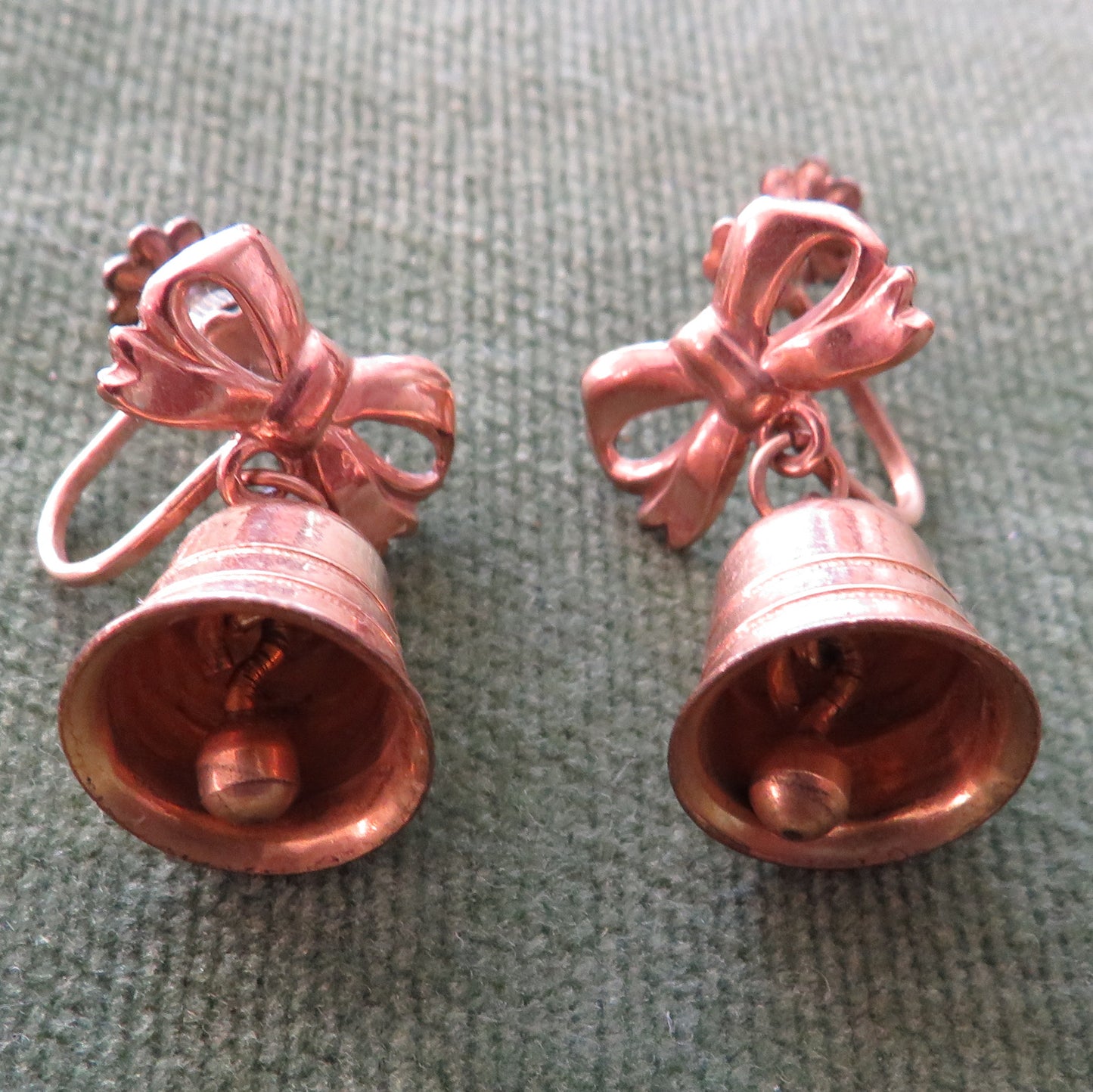 Plated Gold Screw Earrings With An Articulating Bell Hung From A Bow