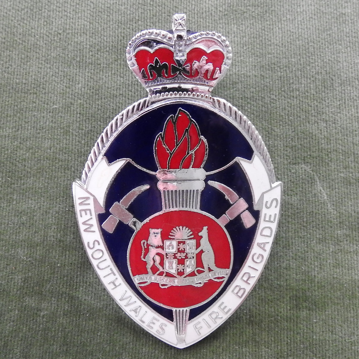 NSW Fire Brigade Enameled Cap Badge With St Edwards Crown In Good Condition With Lugs Intact (No Pins)