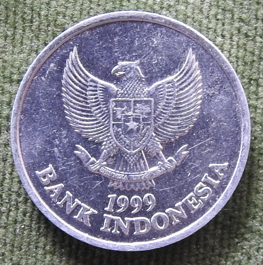 Indonesian 1999 100 Rupiah Black Palm Cockatoo Coin