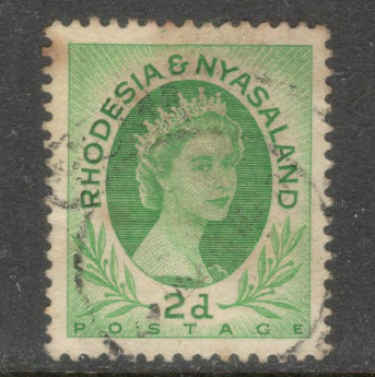 Rhodesia & Nyasaland 1954 2d Light Green Queen Elizabeth II Stamp - Perfin: 13.5x14.0