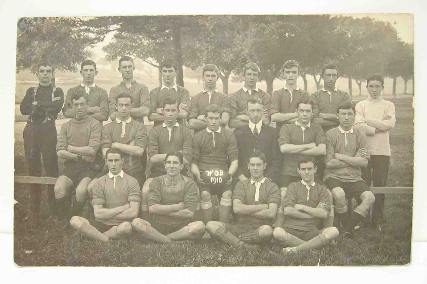 Postcard in black and white of an unknown football team in unused condition.