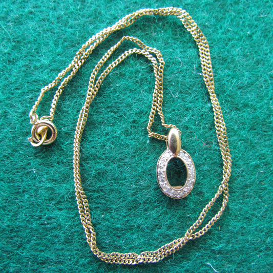 9ct Gold Open Centred Oval Pendant Set With Circumference Diamonds 0.96gms with chain