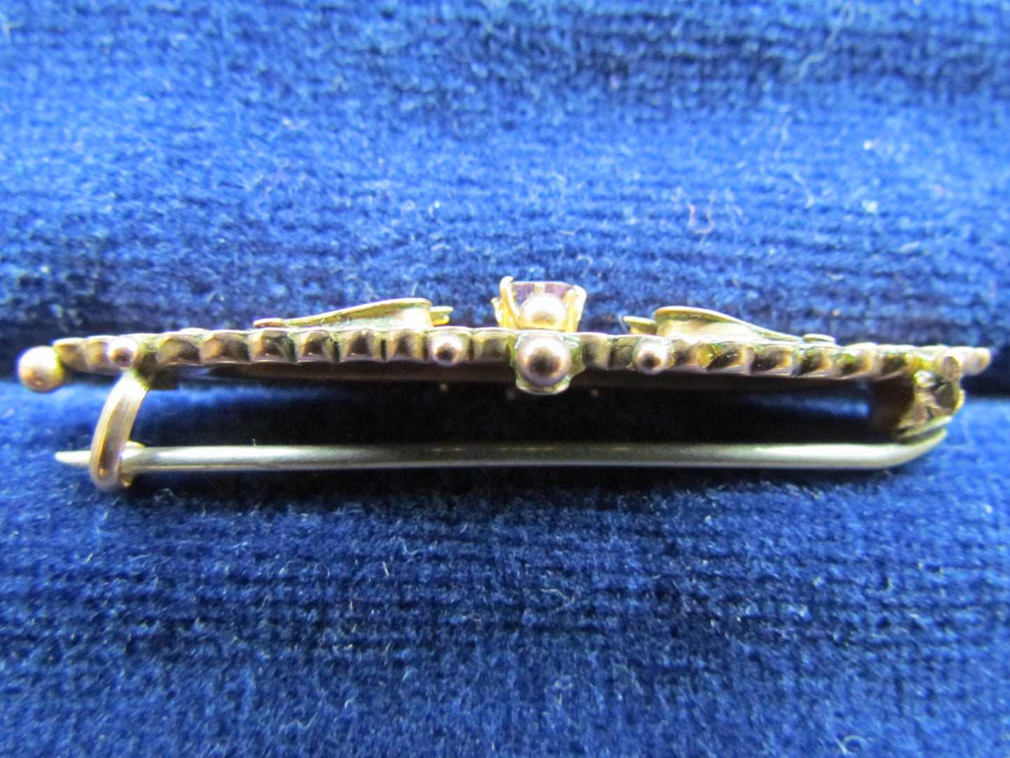 9ct Gold Brooch With A Claw Set Tanzanite Stone