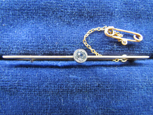 9ct Gold Bar Brooch With A Bezel Set Brilliant Cut White Sapphire