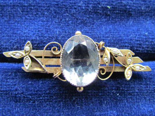 9ct Gold Triple Bar Brooch With A Bezel Set Aquamarine And Seed Peals