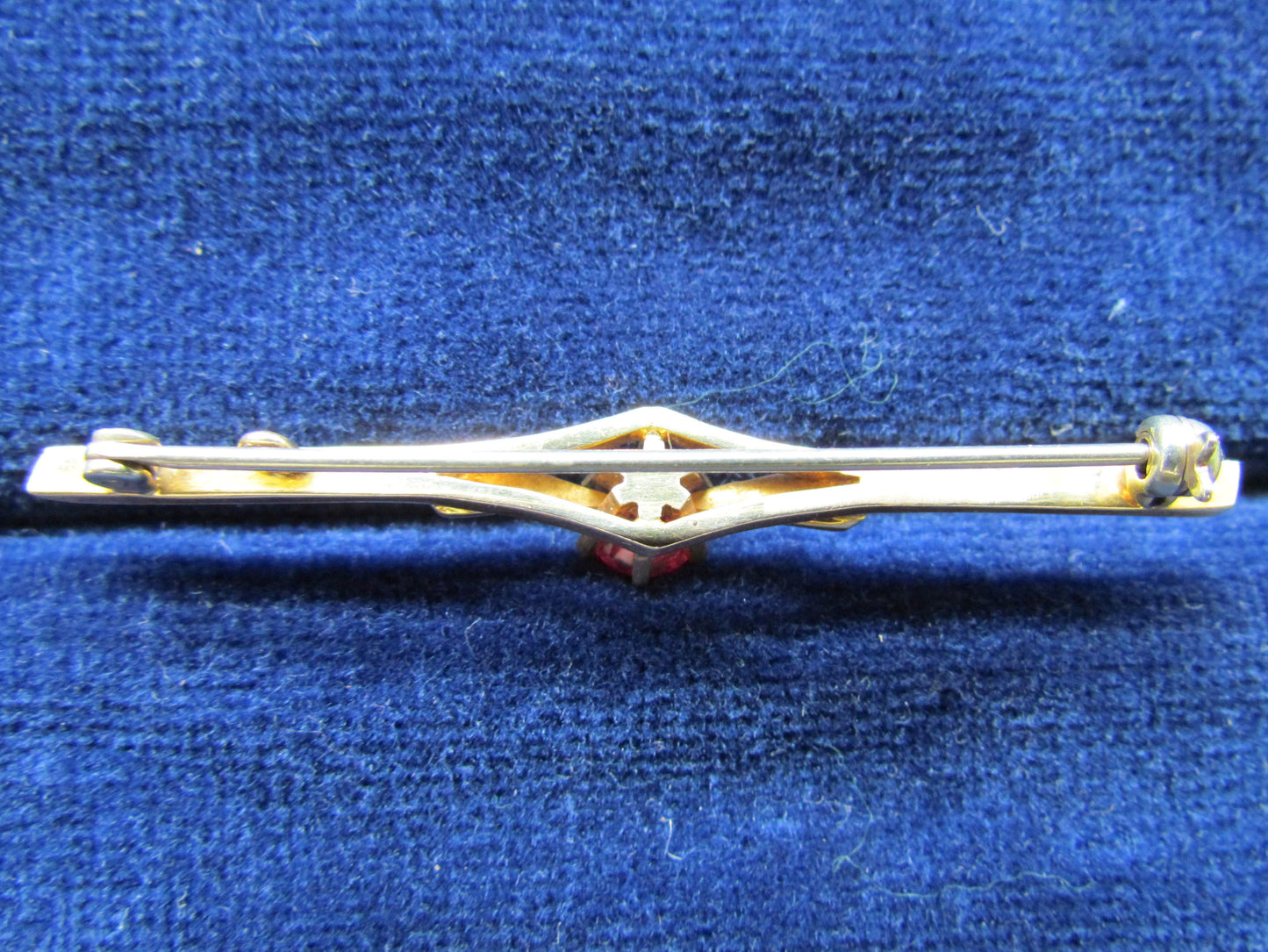 9ct Gold Bar Brooch With A Claw Set Ruby