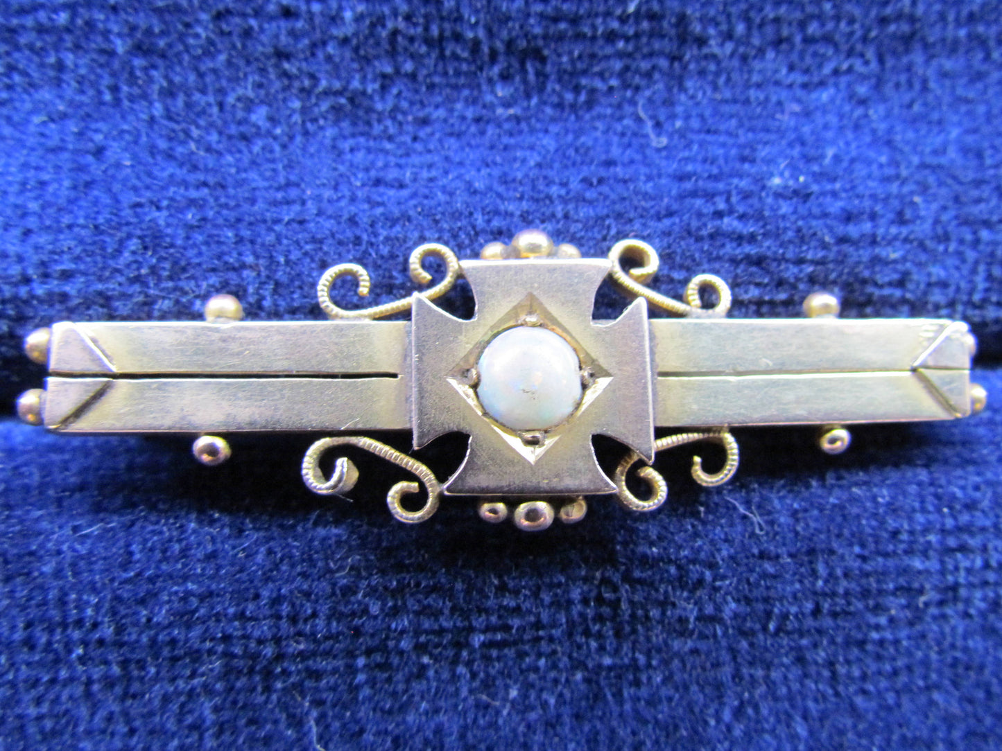 9ct Gold Bar Brooch Set With A Milk / White Opal In A Maltese Cross