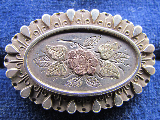 Silver Oval Brooch With Yellow And Rose Gold Overlays Depicting A Floral Theme Hallmarked Birmingham 1911