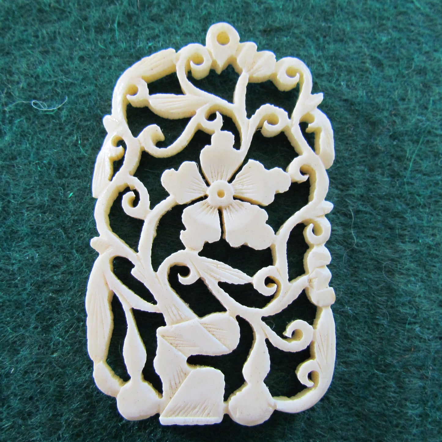 Ivory Pierce Carved Pendant
