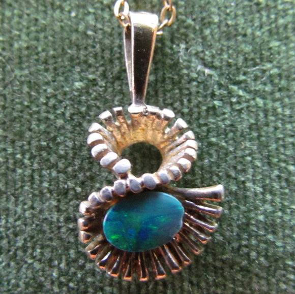 Gilt Pendant With Chain Set With An Opal Doublet