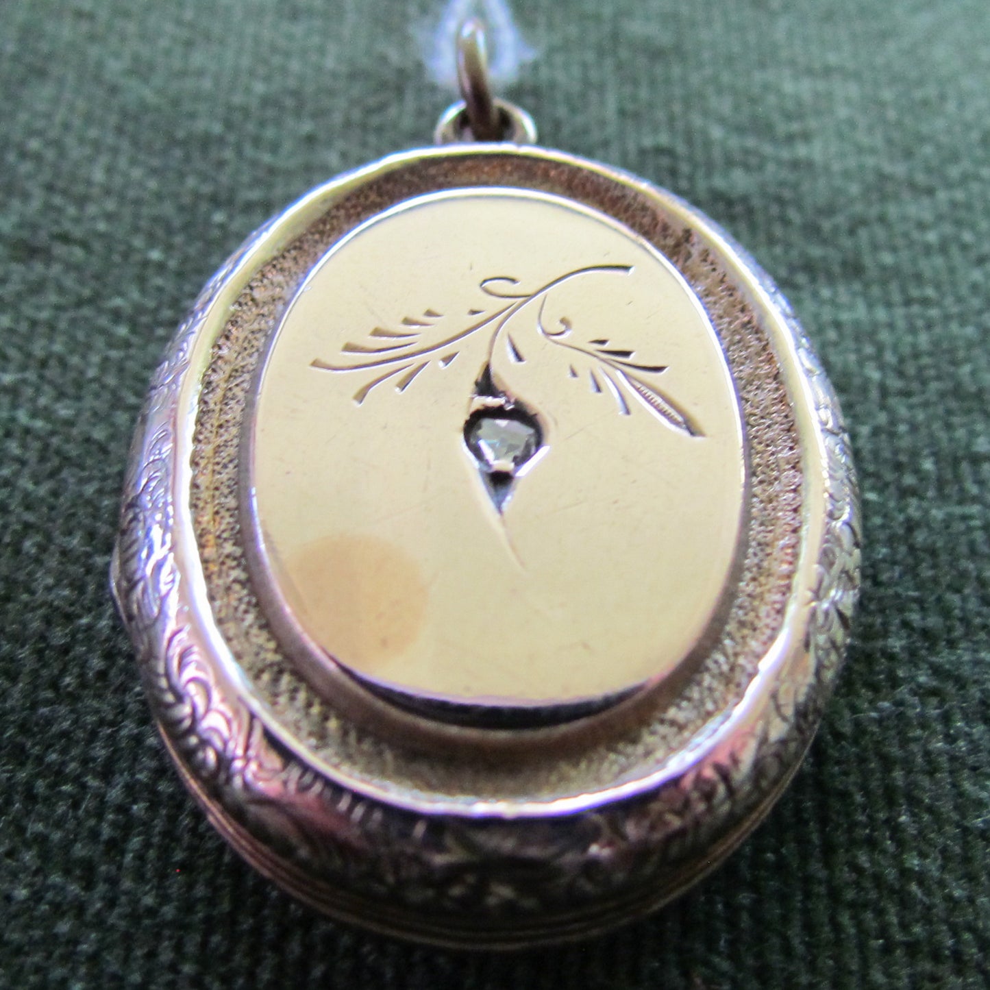 Unmarked Gold Oval Shaped Photo Locket Set With Diamond