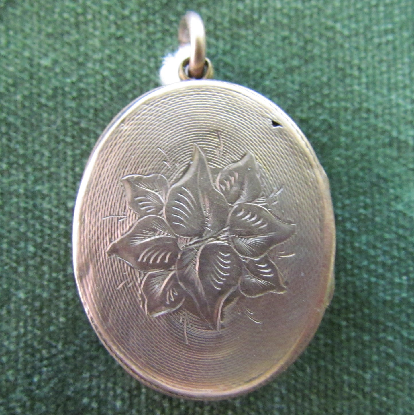 Unmarked Gold Oval Shaped Triple Photo Locket