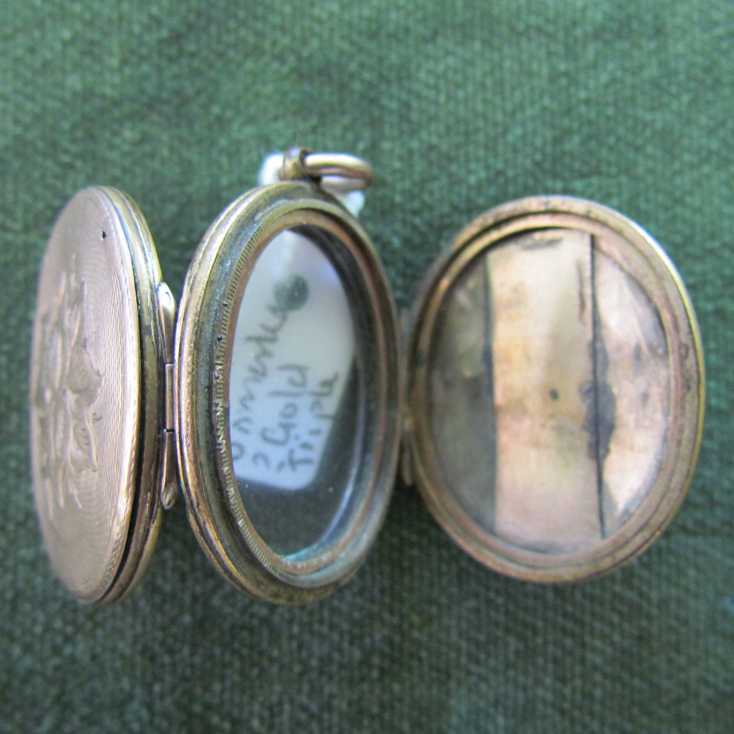 Unmarked Gold Oval Shaped Triple Photo Locket