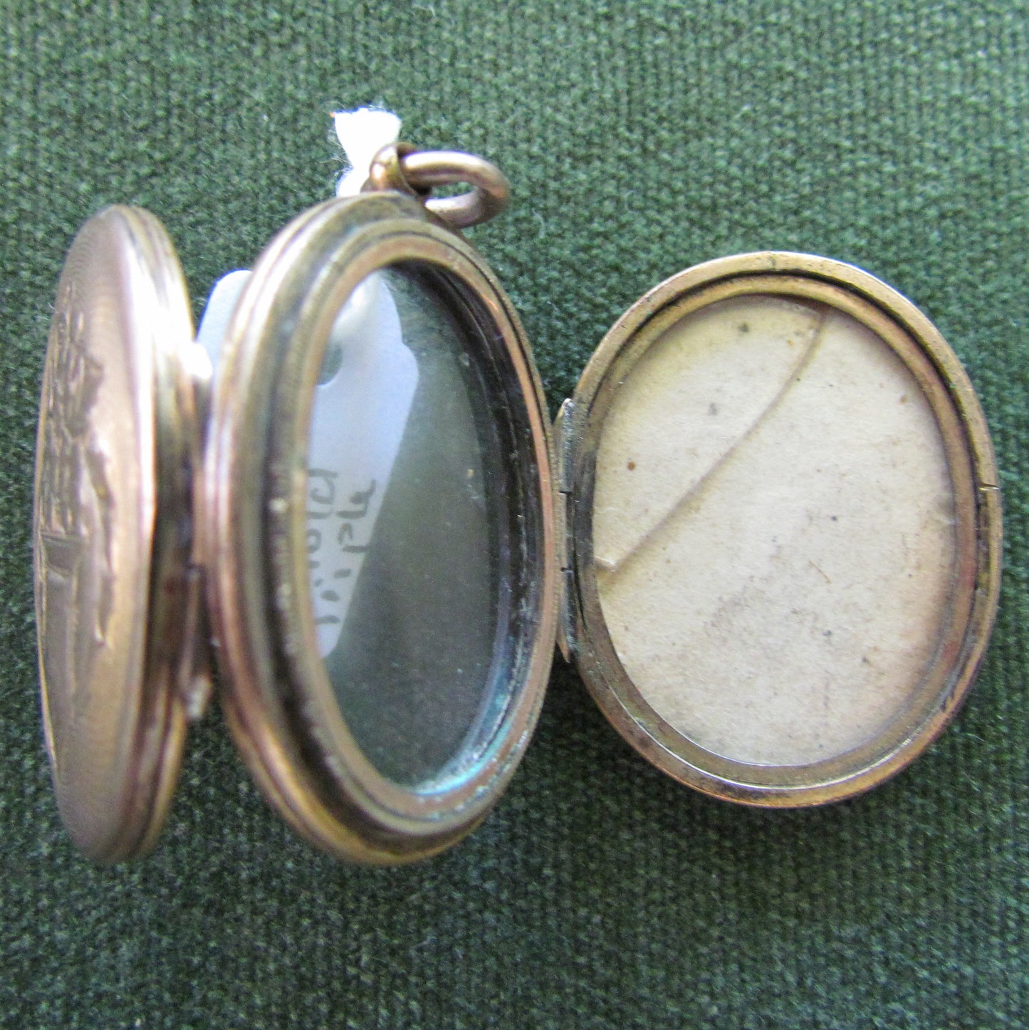 Unmarked Gold Oval Shaped Triple Photo Locket