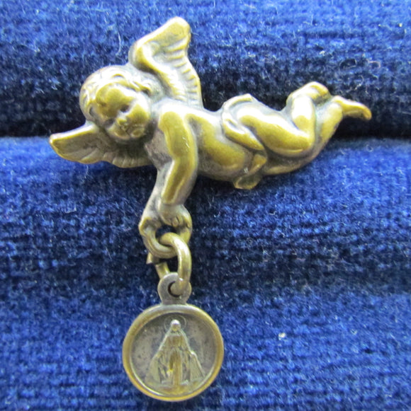 Italian Cherub Brooch Holding A St Christopher Medallion