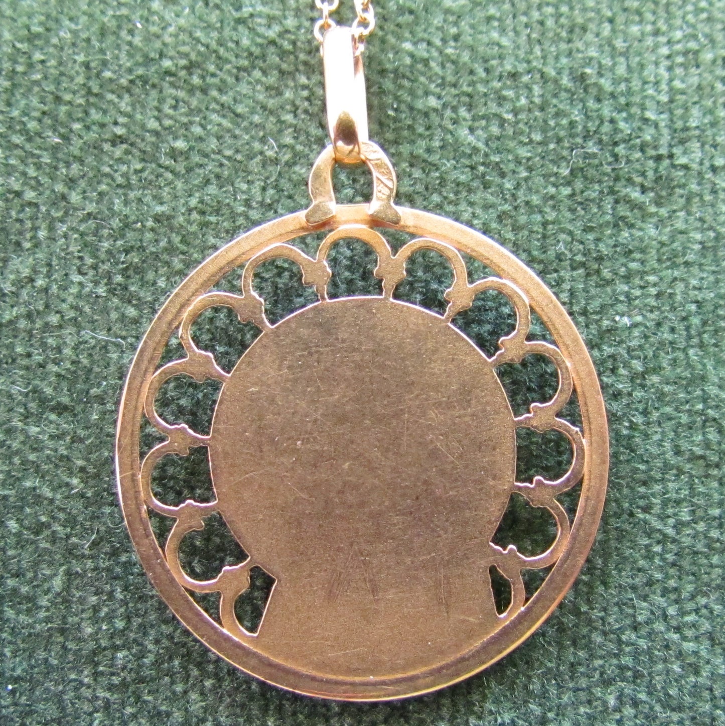 18ct Gold Madonna Pendant On A 9ct Gold Chain
