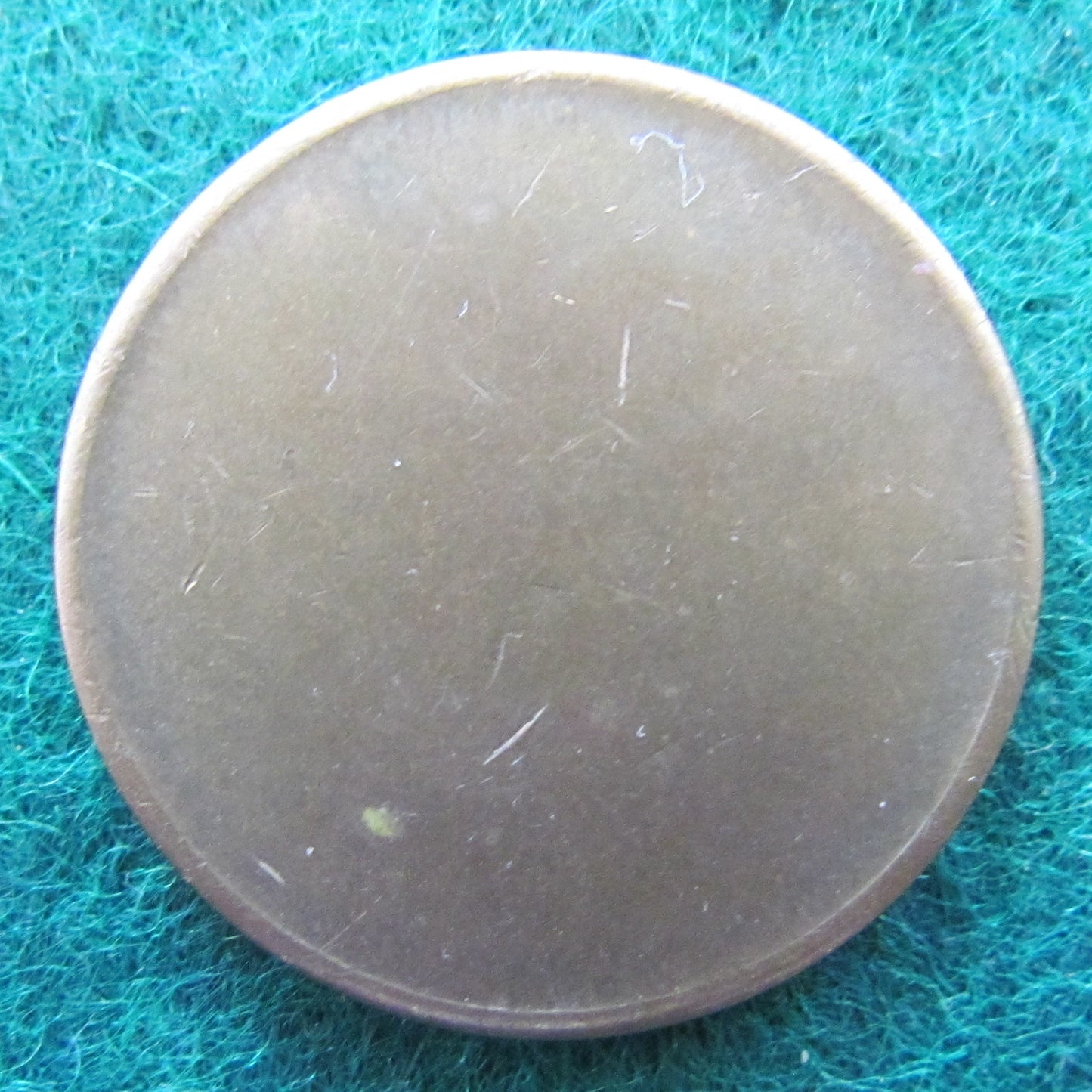 Token Blank Depicting A Wreath On The Face Side